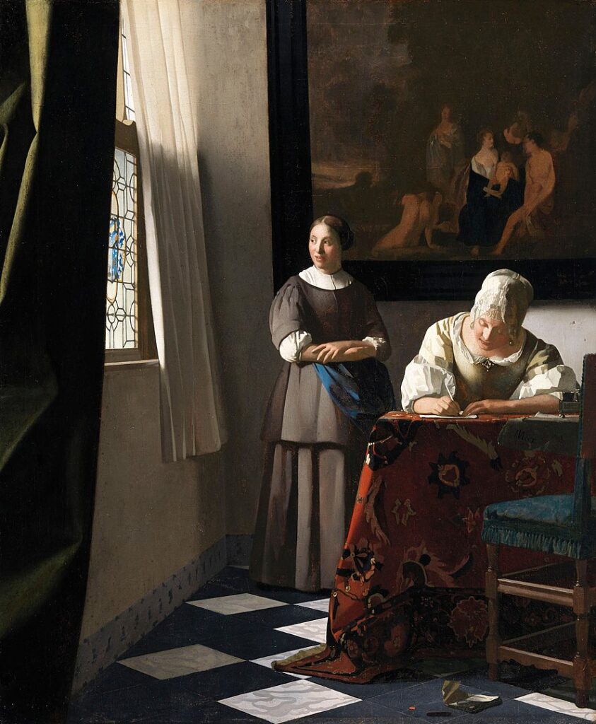 A woman writing a letter, representing the prompt fo readers to get in touch